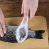 Effortlessly scale fish, cleaning prep done in seconds